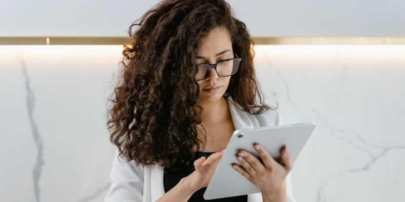 a-woman-using- her-tablet